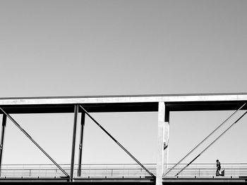 Low angle view of bridge against clear sky