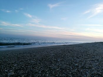 Scenic view of sea against sky at sunset