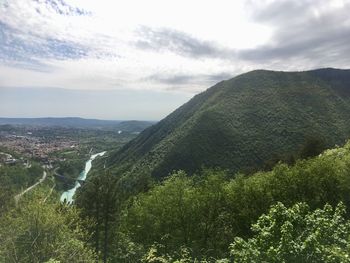 High angle view of trees and mountains against sky