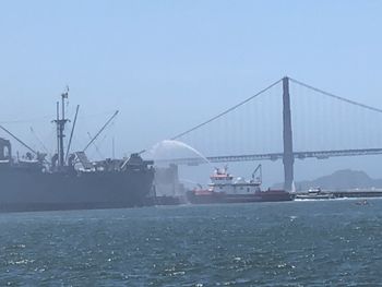 View of bridge over sea against sky
