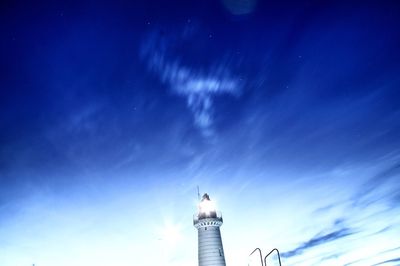 Low angle view of tower against blue sky