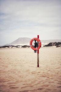 Red lifesaver on the beach