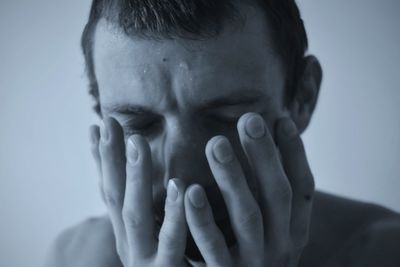 Close-up portrait of mid adult man