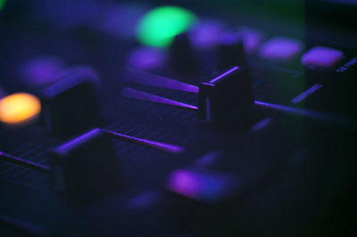 Close-up of sound mixer knobs