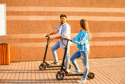 Young couple walking outdoors