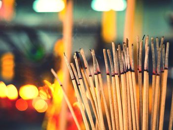 Close-up of incense sticks at temple