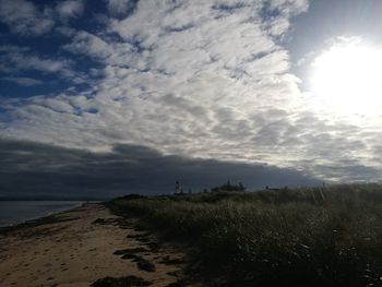 Scenic view of sea against sky at sunset