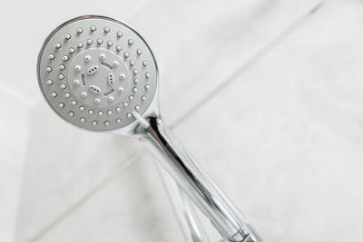 High angle view of water drops on metal