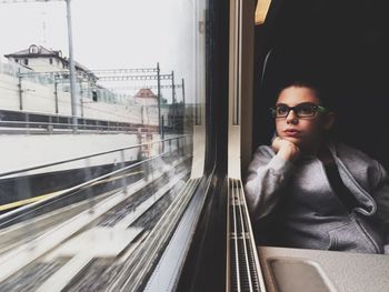 Woman sitting in train