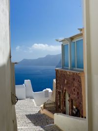 View of sea with buildings in background