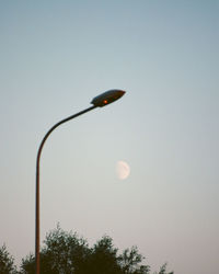 Low angle view of street light against clear sky