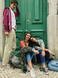 Full length portrait of happy friends