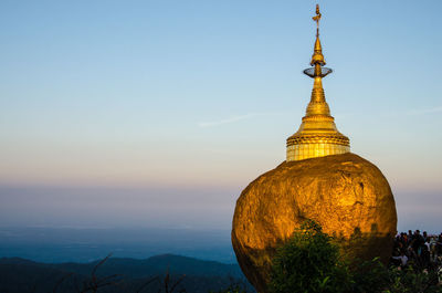 Silhouette of temple against clear sky