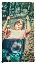 Portrait of smiling girl playing at playground