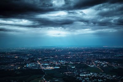 Aerial view of cityscape against sky