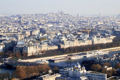 Aerial view of cityscape against sky