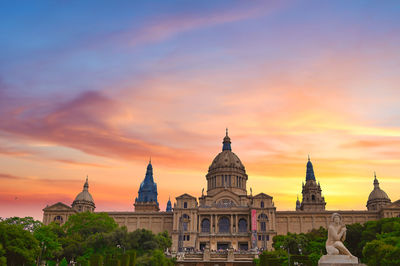 Historic building against sky during sunset