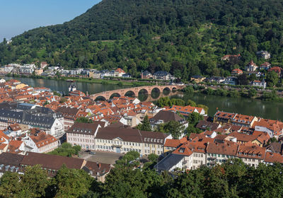 High angle view of townscape by river