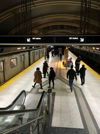 People waiting at railroad station