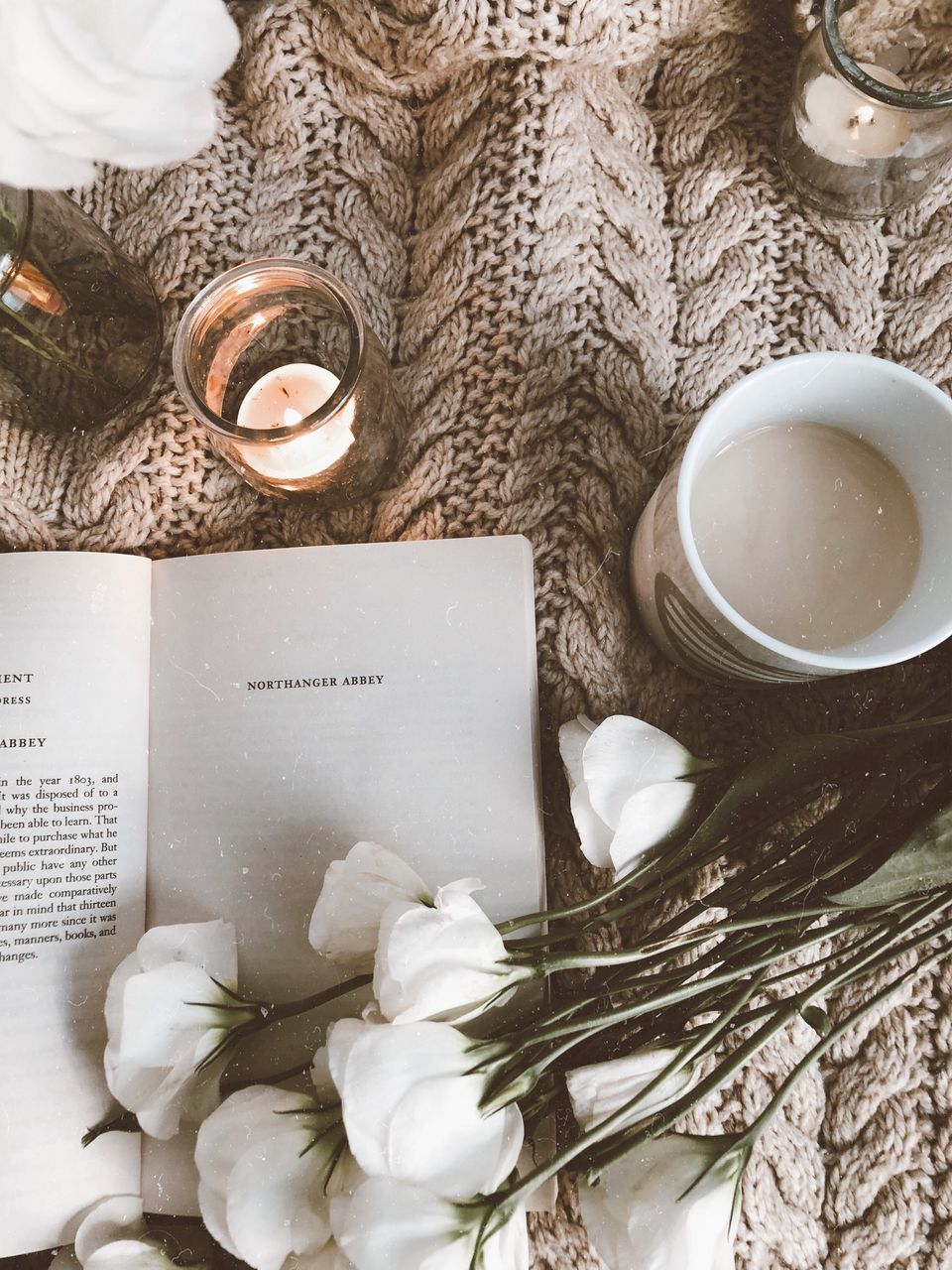 DIRECTLY ABOVE SHOT OF COFFEE CUP ON TABLE WITH SPOON