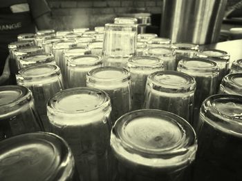 Close-up of upside down drinking glasses at market stall