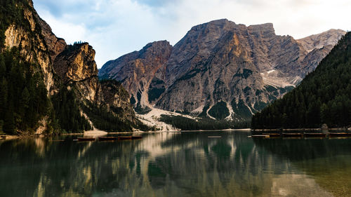 Scenic view of lake and mountains against sky