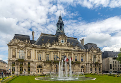 View of historic building against cloudy sky