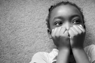 Portrait of child against wall