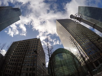 Low angle view of buildings against sky in city