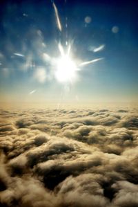Sun shining through clouds