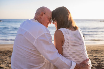 Side view of woman looking at beach