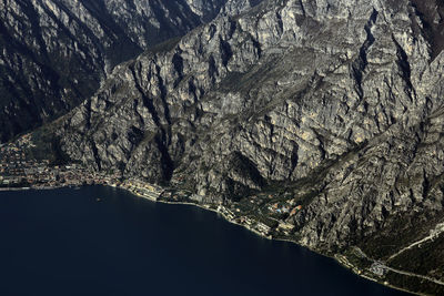 Aerial view of garda lake rocky coast roads, limone, italy