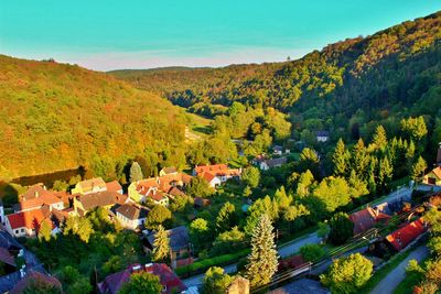 High angle view of autumn trees against sky