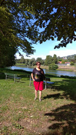 Full length of woman standing on field