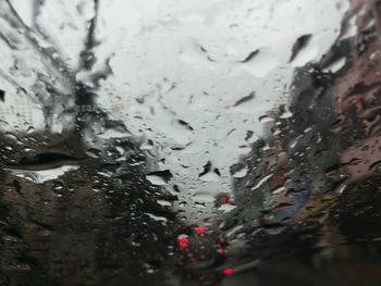 Close-up of raindrops on glass window