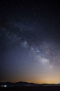 Scenic view of star field against sky at night