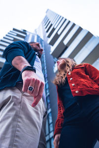 Low angle view of young man and woman