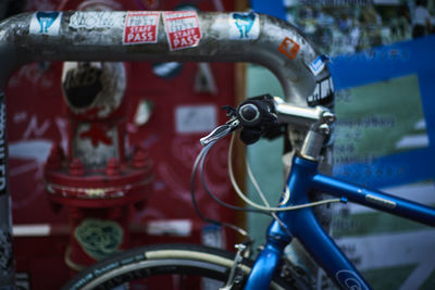 Cropped image of bicycle at parking station