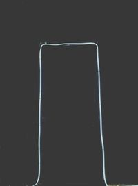 Close-up of wine glass against black background