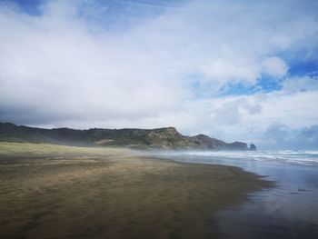 Scenic view of beach against sky