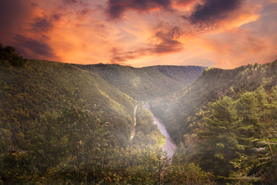 Scenic view of mountains against sky during sunset