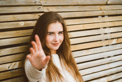 Portrait of smiling young woman outdoors