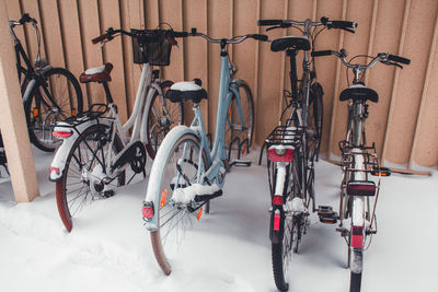 Bicycles on wall in winter