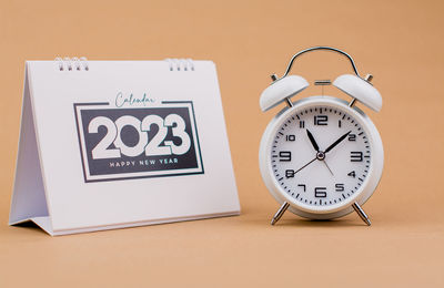 Close-up of clock on white background