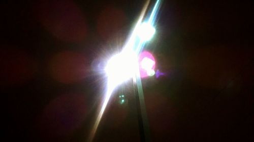 Close-up of illuminated light bulb