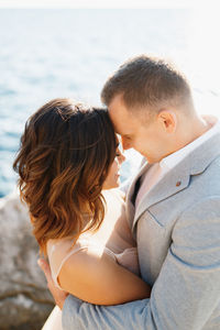 High angle view of couple against sea