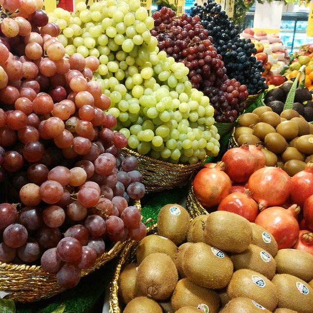 food and drink, food, healthy eating, fruit, freshness, for sale, market stall, market, retail, abundance, large group of objects, ripe, choice, variation, organic, still life, grape, vegetable, heap, high angle view