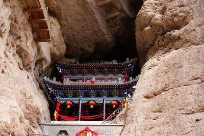 Low angle view of temple by building