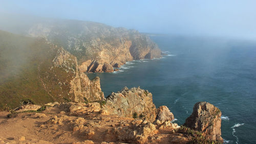 Scenic view of sea and mountains