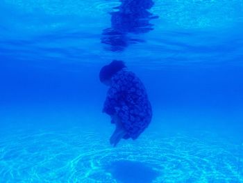 Man swimming in sea